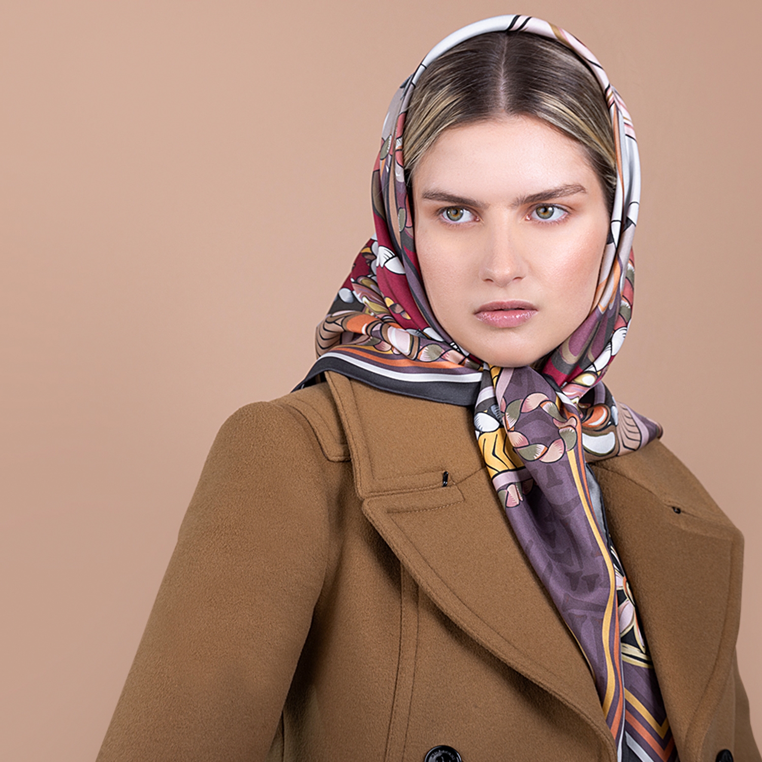 heritage silk scarf in brown on model as head scarf